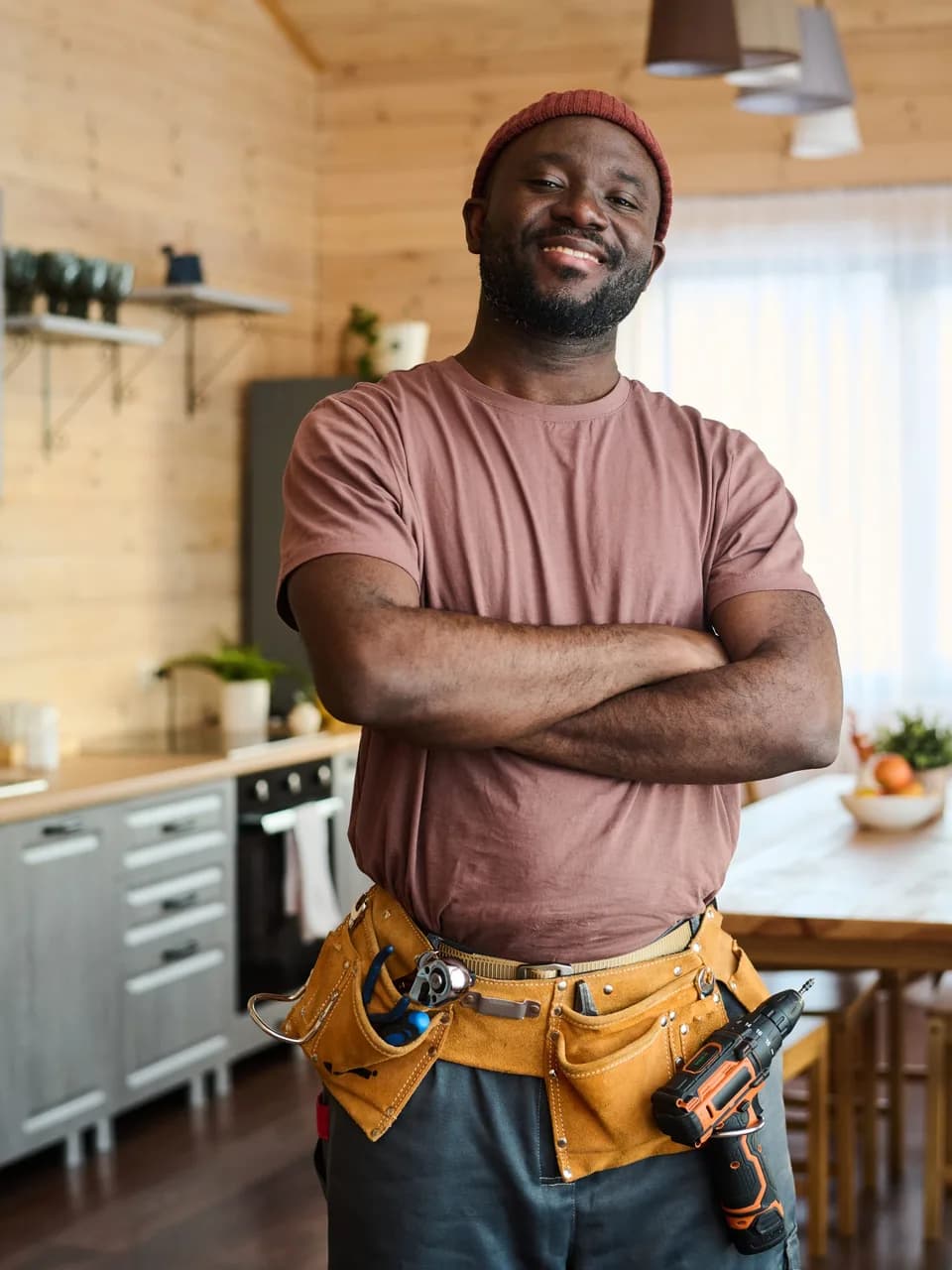 A tradesperson with their tools, ready to start work